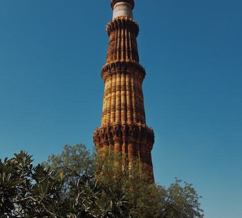 Qutub Minar against blue sky, Delhi